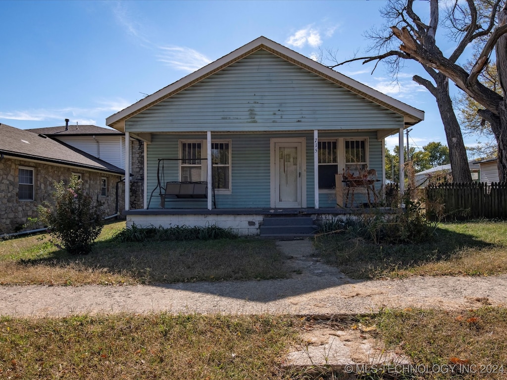 bungalow-style house featuring covered porch