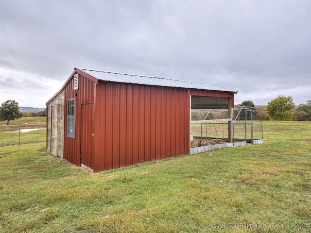 view of outbuilding featuring an outdoor structure