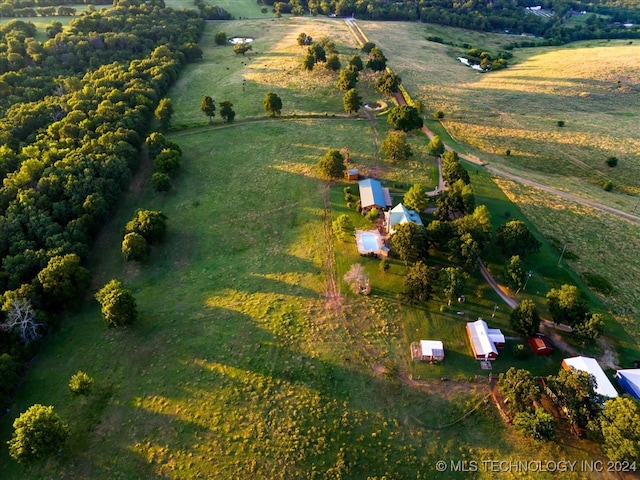 birds eye view of property featuring a rural view