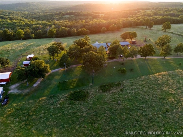 birds eye view of property featuring a rural view