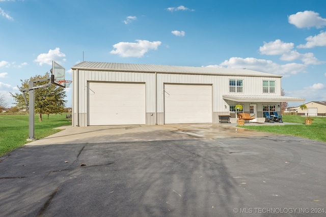 garage with a lawn