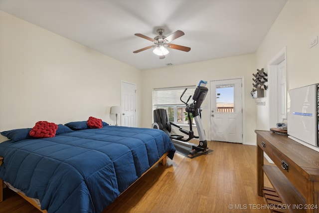 bedroom featuring light hardwood / wood-style floors and ceiling fan