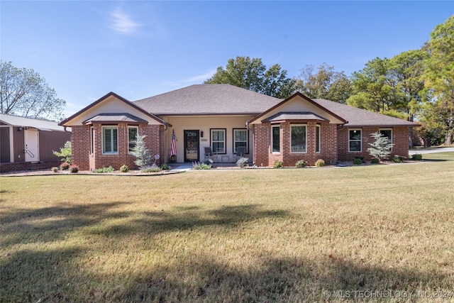 ranch-style home with a front yard