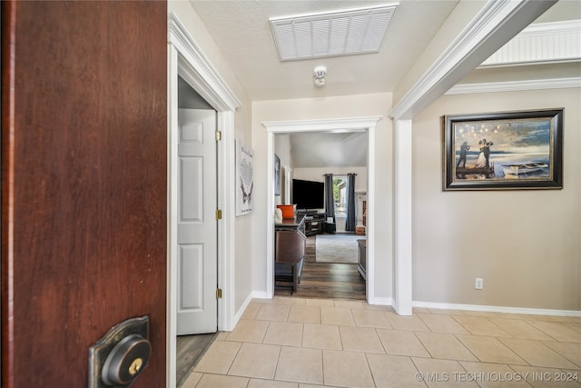 hall with light hardwood / wood-style floors