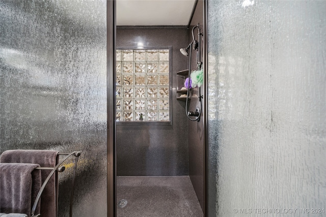 bathroom featuring an enclosed shower