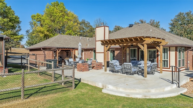 rear view of property featuring a gazebo, a yard, a patio, and a pergola