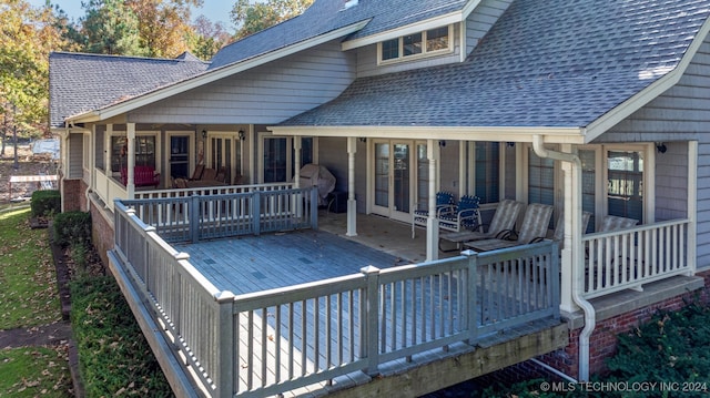 rear view of house with a deck