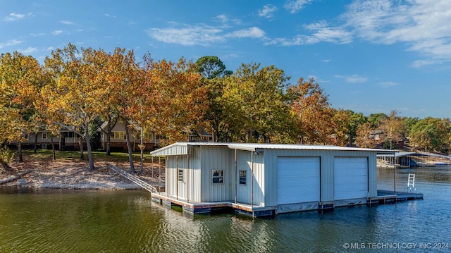 dock area featuring a water view