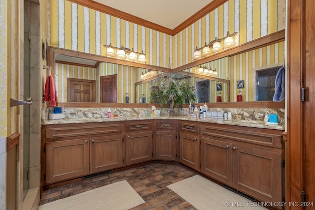 bathroom featuring vanity and crown molding