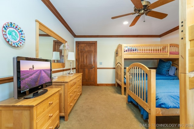 bedroom with light carpet, ornamental molding, and ceiling fan