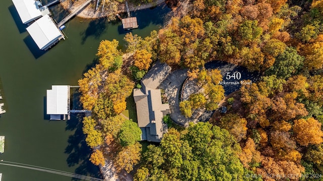 birds eye view of property featuring a water view