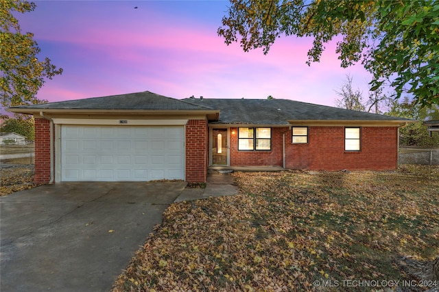 ranch-style house with a garage