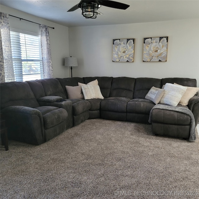 living room with carpet flooring and ceiling fan