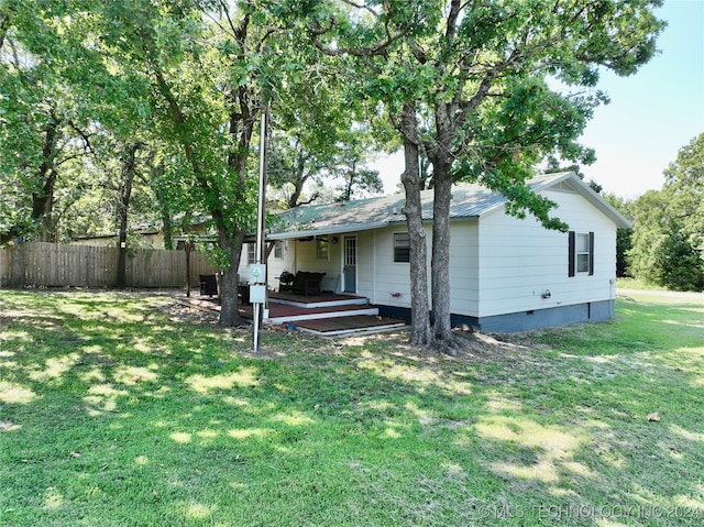 exterior space with a yard