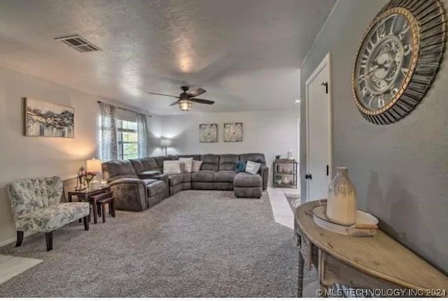 living room with ceiling fan and light carpet