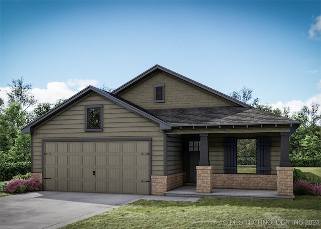 view of front facade with a front lawn and a garage