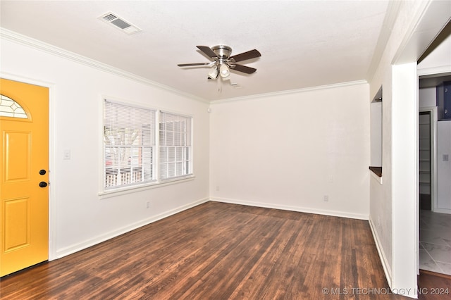 entryway featuring dark wood-type flooring, ceiling fan, ornamental molding, and a textured ceiling