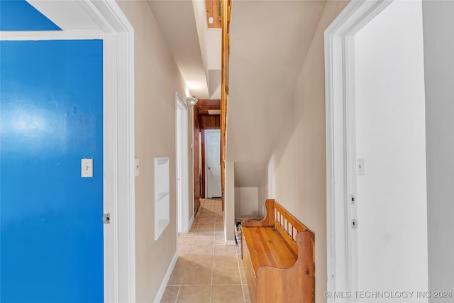 hallway with light tile patterned floors