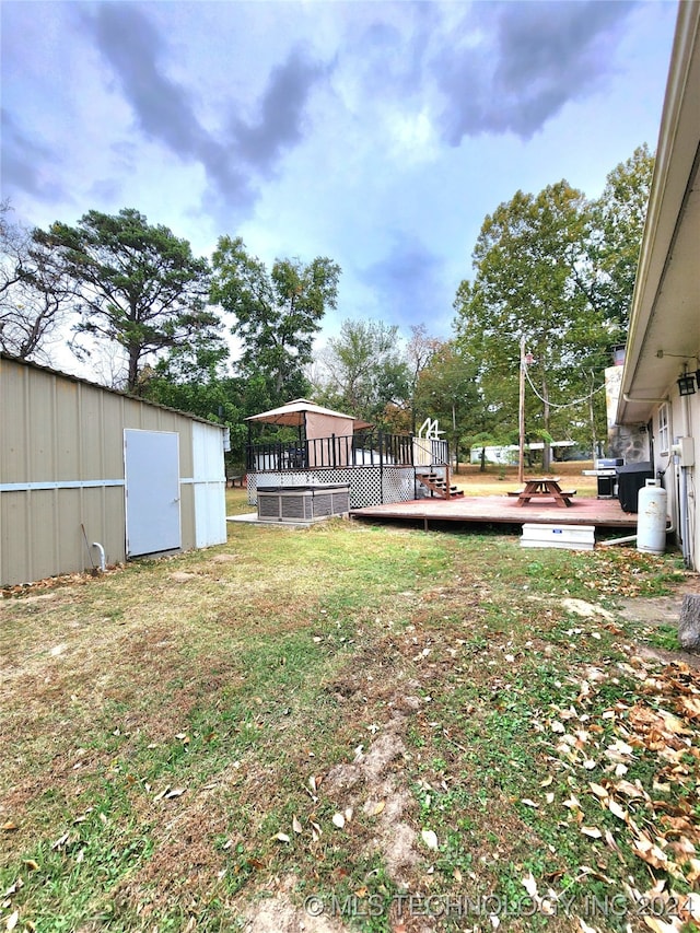 view of yard featuring a deck