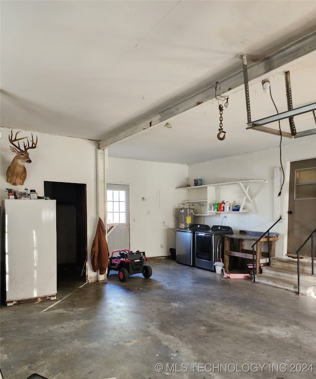 garage featuring independent washer and dryer