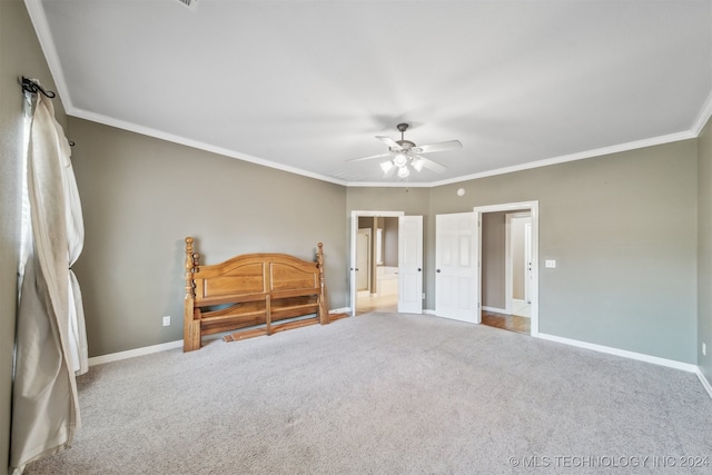 bedroom with ornamental molding, light colored carpet, and ceiling fan