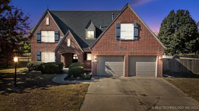 tudor house with a garage