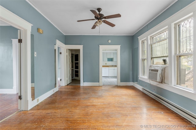 unfurnished living room with a baseboard radiator, light hardwood / wood-style flooring, ornamental molding, and ceiling fan