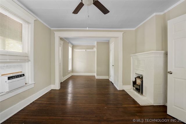 unfurnished living room with dark wood-type flooring, crown molding, cooling unit, and ceiling fan