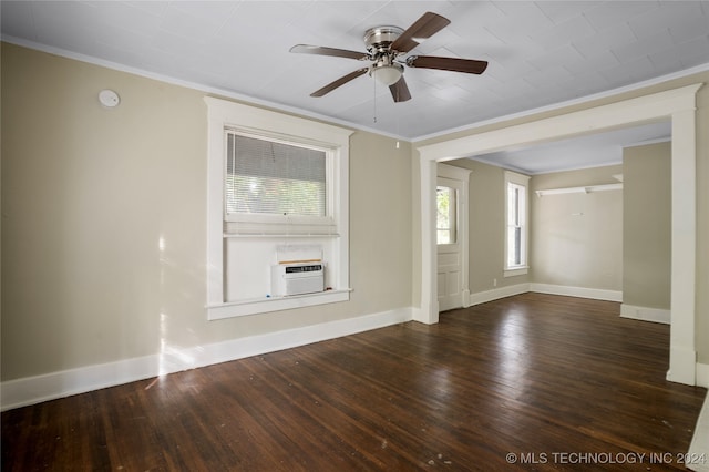 unfurnished living room with ceiling fan, a healthy amount of sunlight, and dark hardwood / wood-style floors