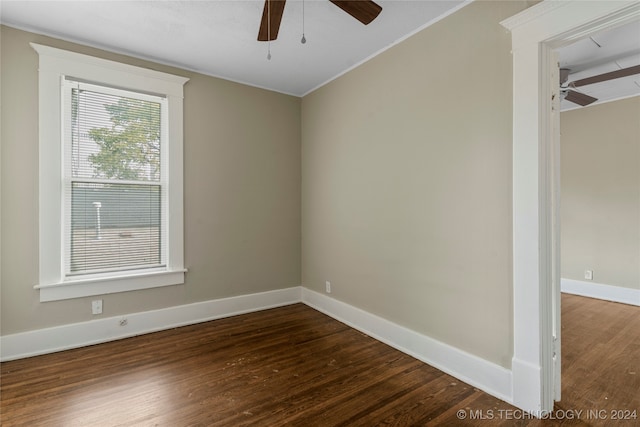 spare room featuring ornamental molding, hardwood / wood-style floors, and ceiling fan