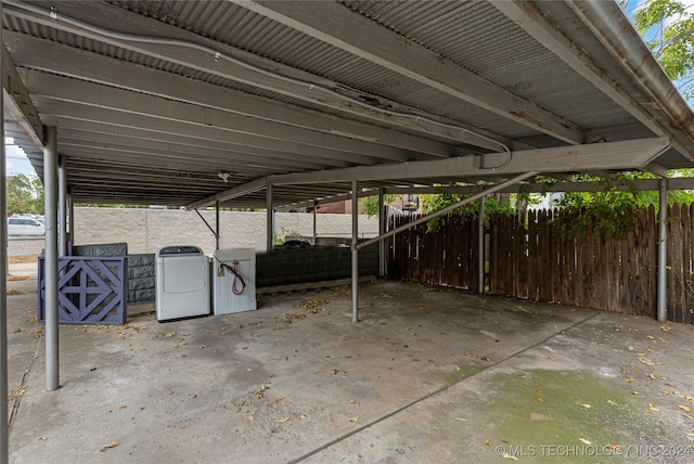 view of patio / terrace featuring washing machine and clothes dryer