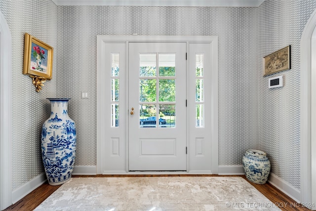 entryway with light hardwood / wood-style floors