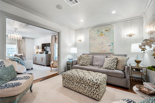 living room featuring ornamental molding and hardwood / wood-style floors