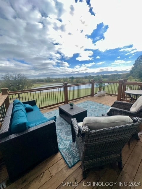 125 Falconhead Unit E, Burneyville, OK 73430 - wooden terrace with outdoor lounge area and a water view
