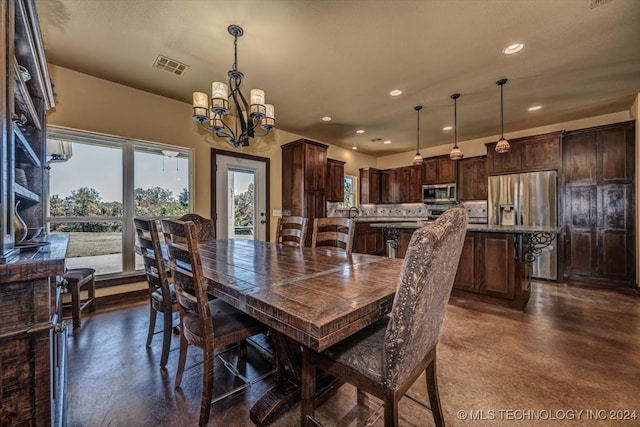 dining room with an inviting chandelier