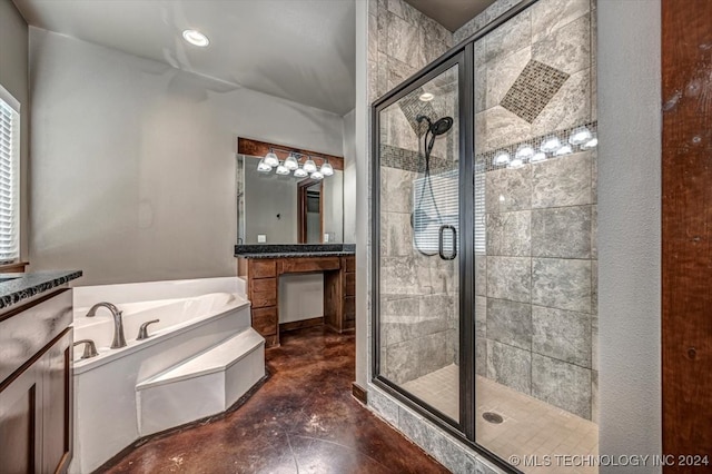 bathroom with vanity and separate shower and tub