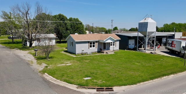 view of front of property with a front lawn