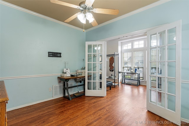 interior space featuring french doors, ceiling fan, crown molding, and wood-type flooring