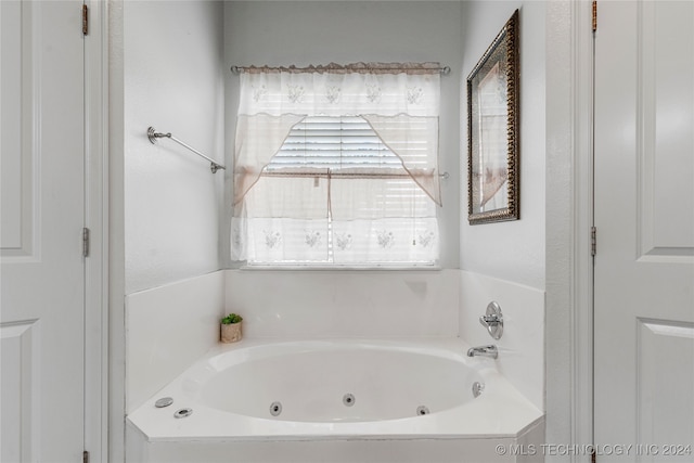 bathroom with a tub