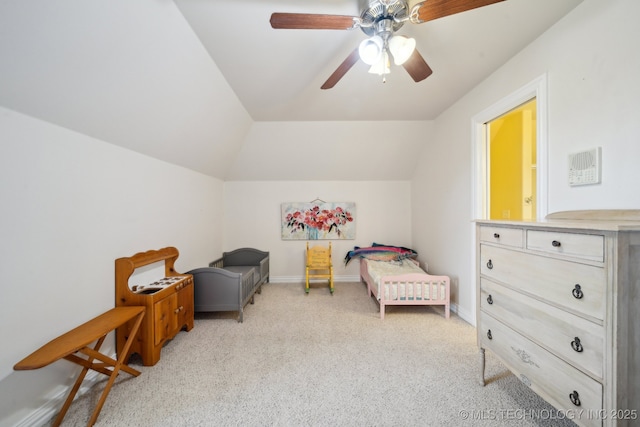 bedroom featuring lofted ceiling, light carpet, and ceiling fan