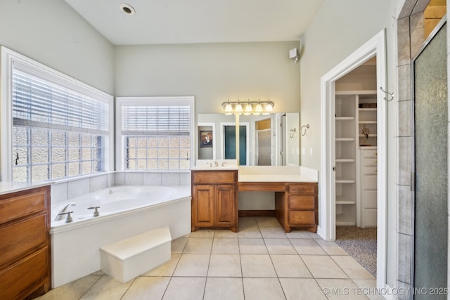 bathroom featuring vanity, separate shower and tub, and tile patterned floors