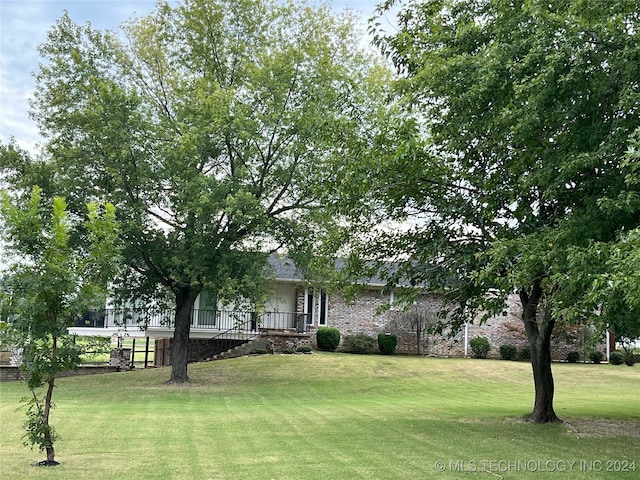 view of front of home with a front yard