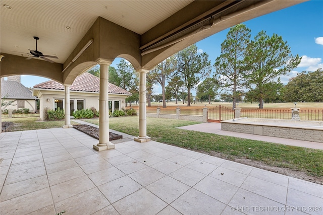 view of patio with ceiling fan