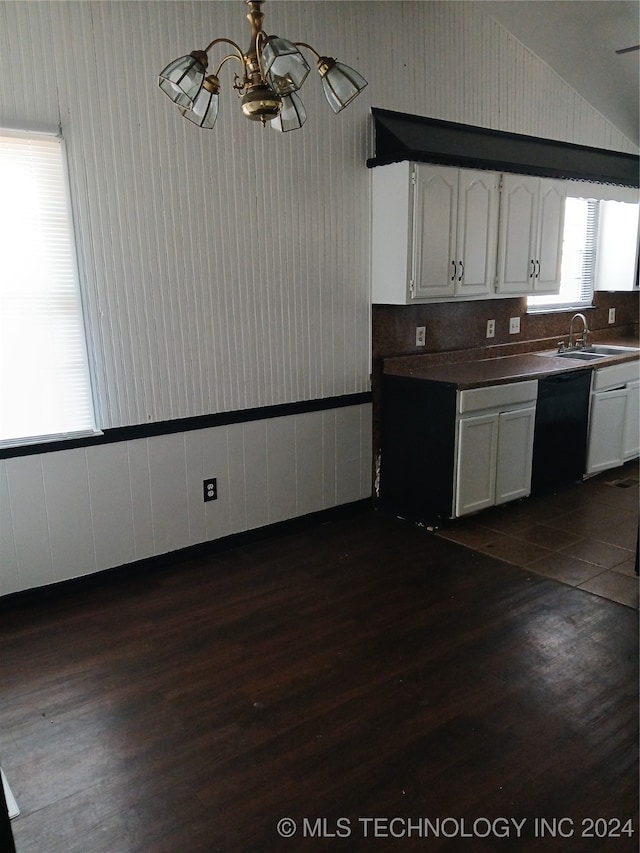 kitchen with black dishwasher, vaulted ceiling, white cabinets, and dark hardwood / wood-style floors