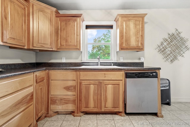 kitchen with sink, light tile patterned floors, and dishwasher