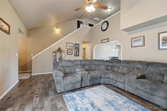 living room with hardwood / wood-style floors, crown molding, high vaulted ceiling, and ceiling fan