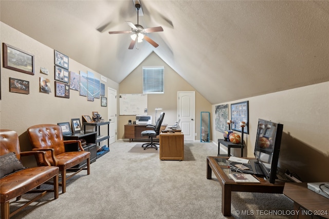 office area with light carpet, lofted ceiling, a textured ceiling, and ceiling fan