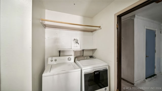 washroom with separate washer and dryer