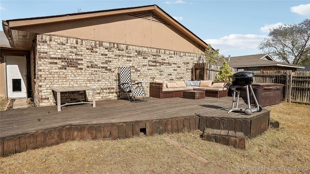 deck featuring outdoor lounge area