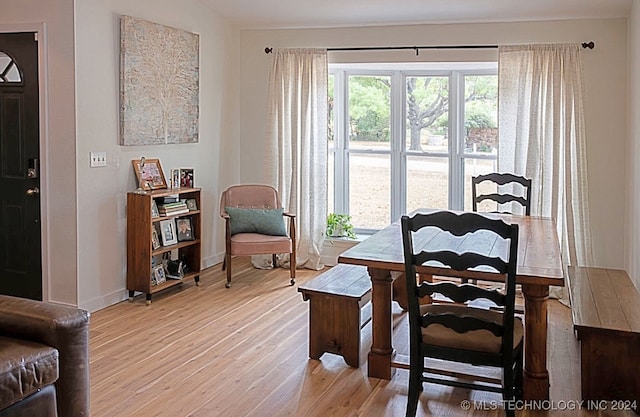 dining room featuring light hardwood / wood-style floors